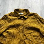 Goldglitzernde Hemdbluse