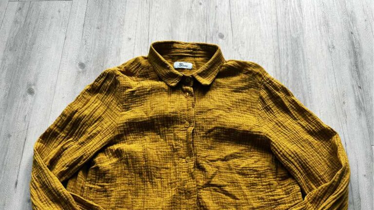 Goldglitzernde Hemdbluse
